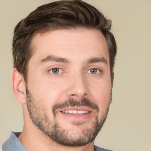 Joyful white young-adult male with short  brown hair and brown eyes