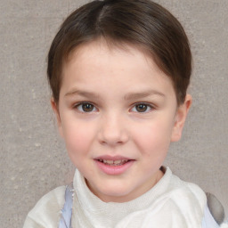 Joyful white child female with short  brown hair and brown eyes