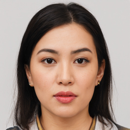 Neutral asian young-adult female with medium  brown hair and brown eyes