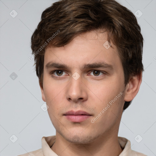 Neutral white young-adult male with short  brown hair and grey eyes