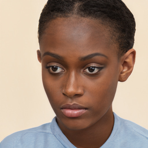 Neutral black young-adult female with short  brown hair and brown eyes