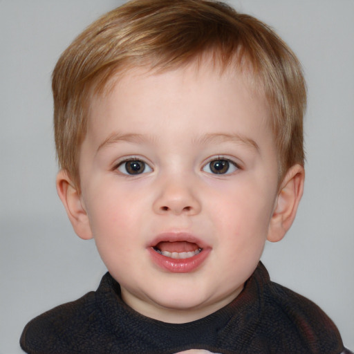 Joyful white child male with short  brown hair and brown eyes