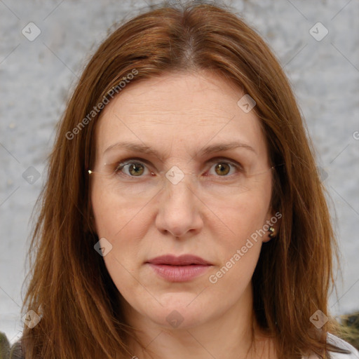 Joyful white adult female with long  brown hair and brown eyes