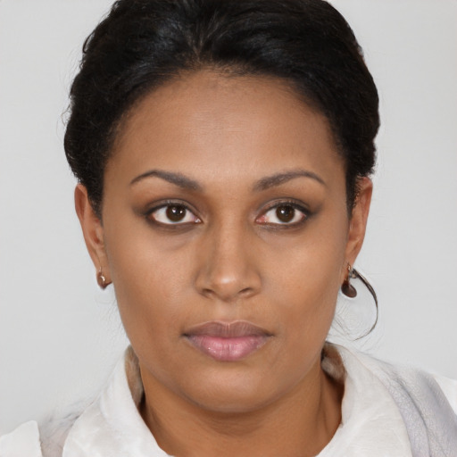 Neutral latino young-adult female with short  brown hair and brown eyes