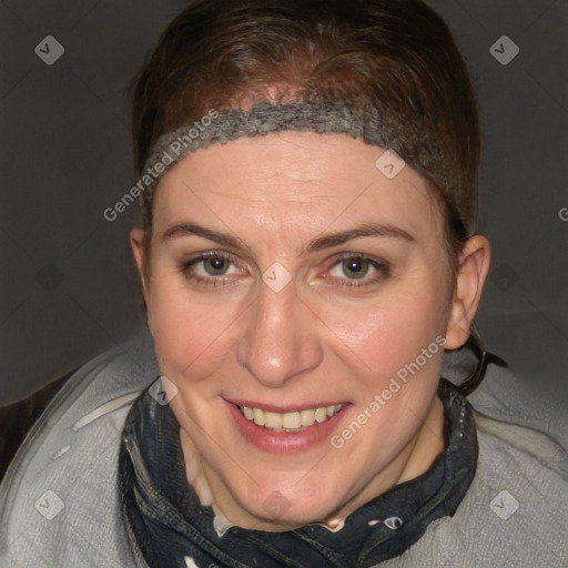 Joyful white adult female with short  brown hair and brown eyes