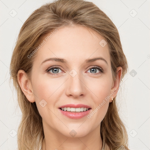 Joyful white young-adult female with long  brown hair and blue eyes