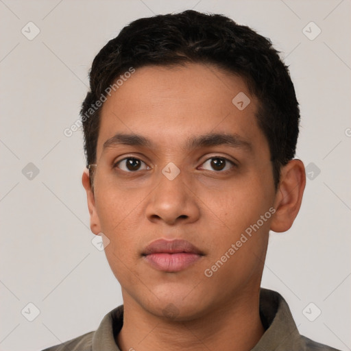 Neutral latino young-adult male with short  black hair and brown eyes