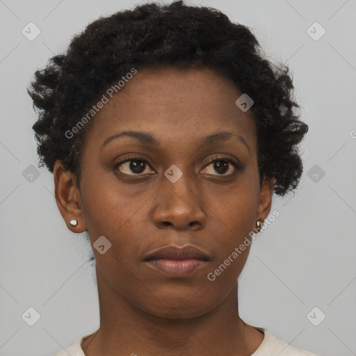 Neutral black young-adult female with short  brown hair and brown eyes