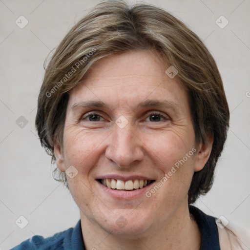 Joyful white adult female with medium  brown hair and brown eyes