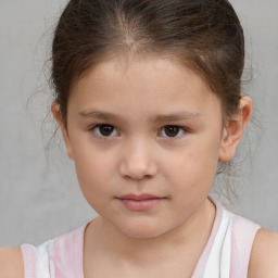 Neutral white child female with short  brown hair and brown eyes