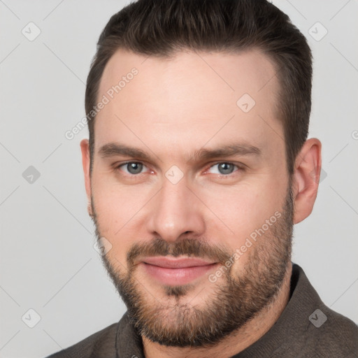 Neutral white young-adult male with short  brown hair and brown eyes