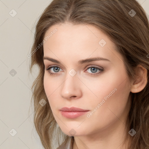 Neutral white young-adult female with long  brown hair and brown eyes