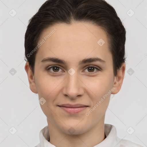 Joyful white young-adult female with short  brown hair and brown eyes