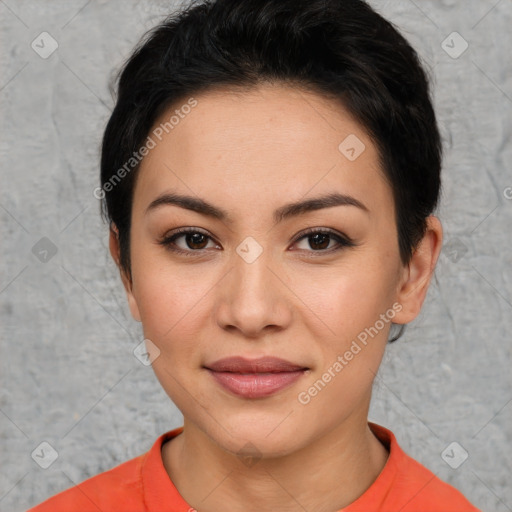 Joyful asian young-adult female with short  black hair and brown eyes