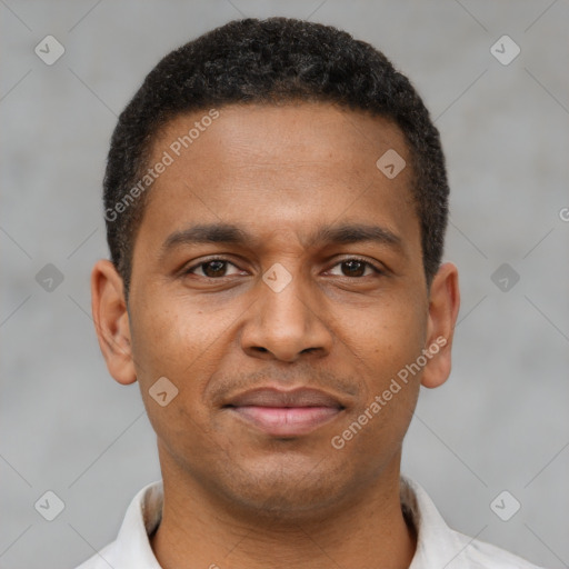 Joyful latino young-adult male with short  brown hair and brown eyes