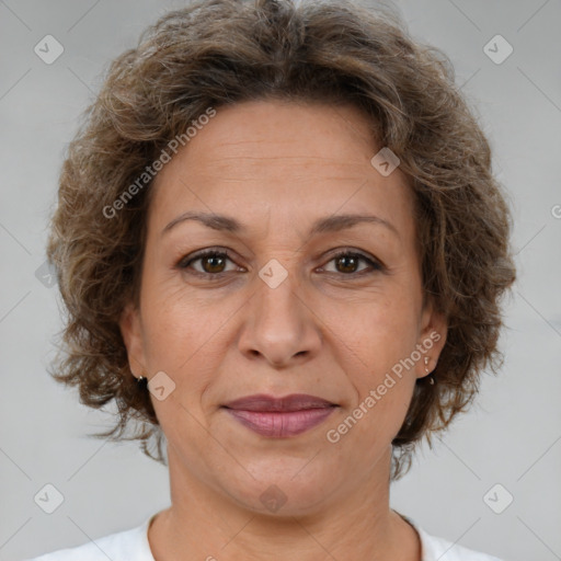 Joyful white adult female with short  brown hair and brown eyes