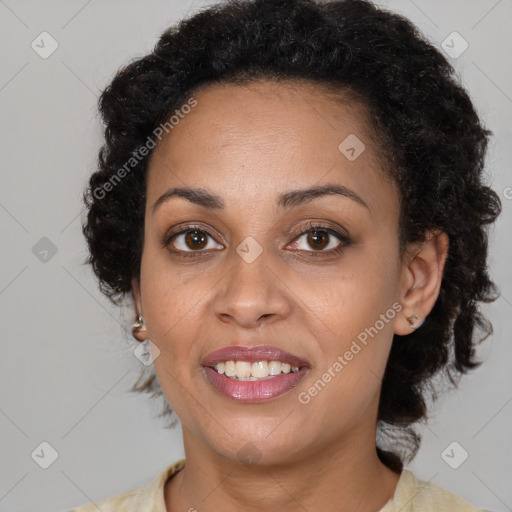 Joyful black young-adult female with medium  brown hair and brown eyes