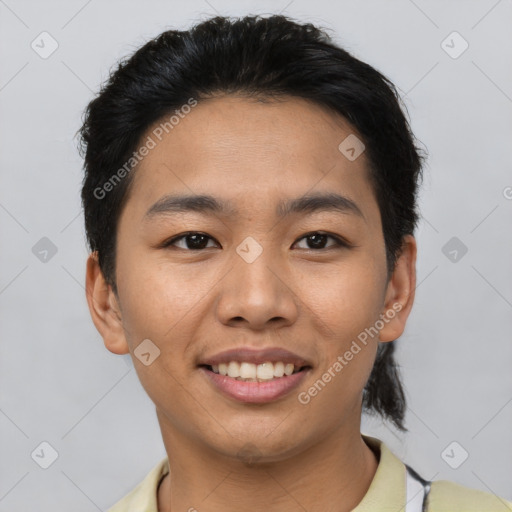 Joyful latino young-adult male with short  black hair and brown eyes