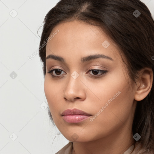 Neutral white young-adult female with long  brown hair and brown eyes