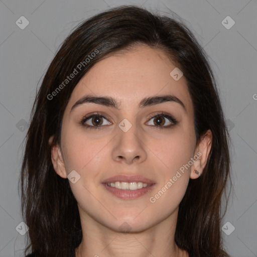 Joyful white young-adult female with long  brown hair and brown eyes