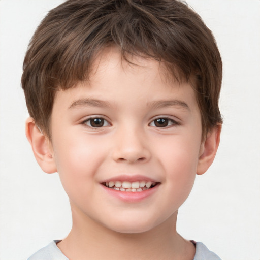 Joyful white child male with short  brown hair and brown eyes