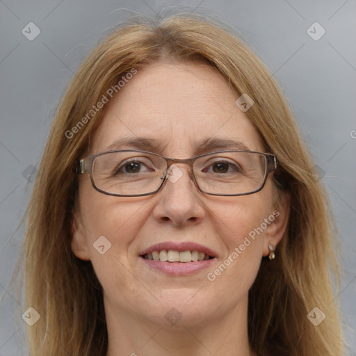 Joyful white adult female with medium  brown hair and brown eyes