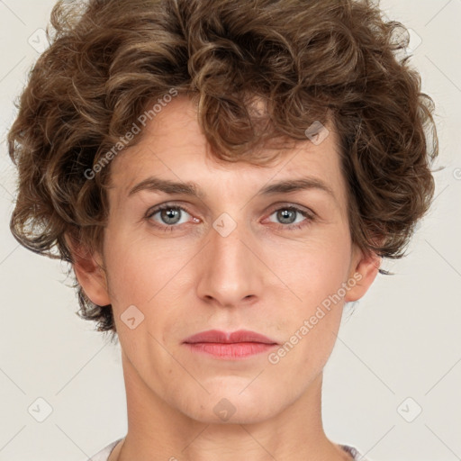 Joyful white young-adult male with short  brown hair and green eyes