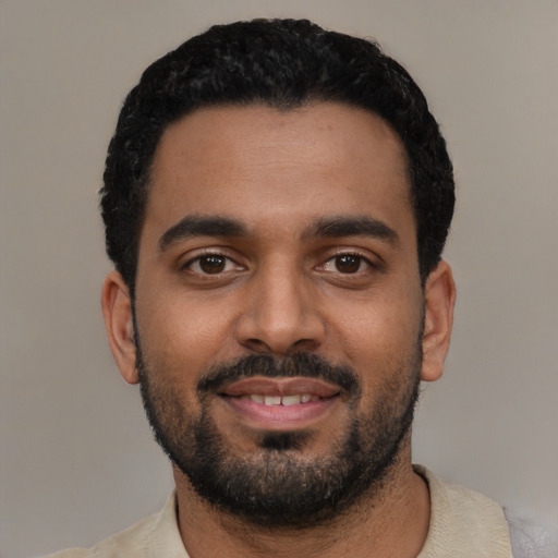 Neutral black young-adult male with short  black hair and brown eyes