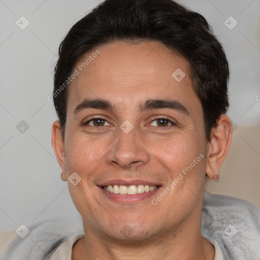 Joyful white adult male with short  brown hair and brown eyes