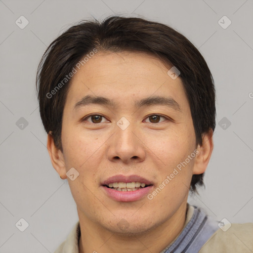 Joyful asian young-adult male with short  brown hair and brown eyes