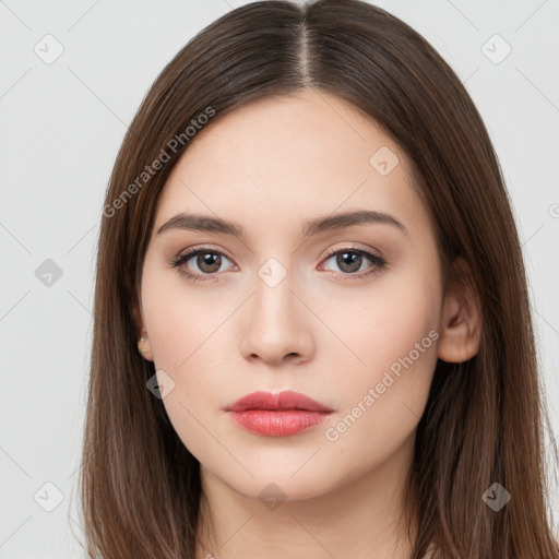 Neutral white young-adult female with long  brown hair and brown eyes