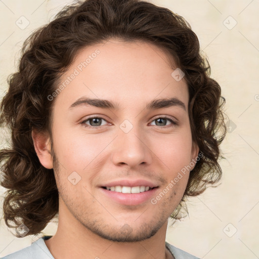 Joyful white young-adult male with medium  brown hair and brown eyes