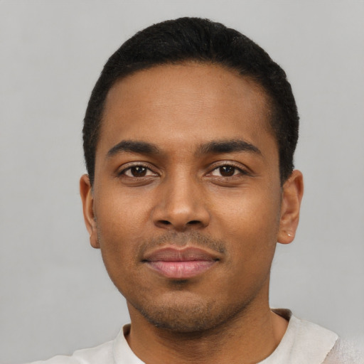 Neutral black young-adult male with short  black hair and brown eyes
