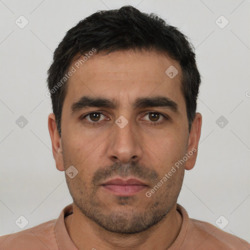 Neutral white young-adult male with short  black hair and brown eyes
