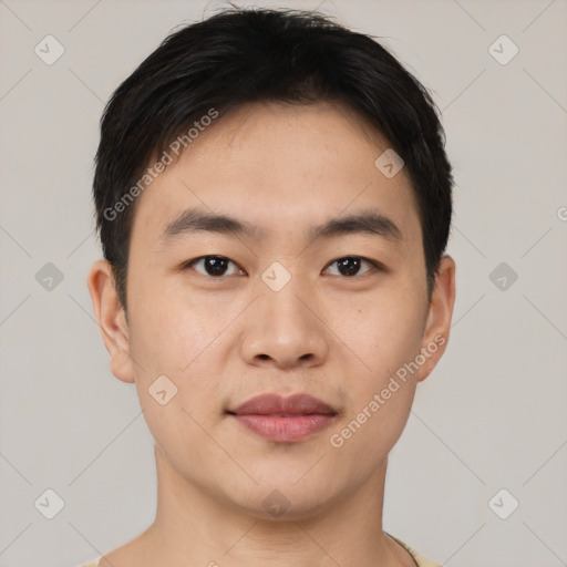 Joyful asian young-adult male with short  black hair and brown eyes