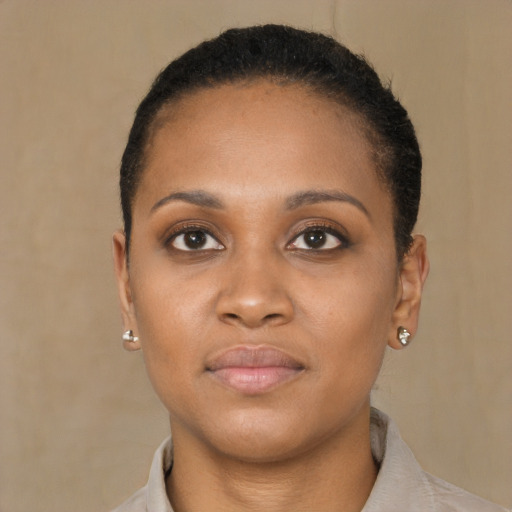 Neutral black young-adult female with short  brown hair and brown eyes