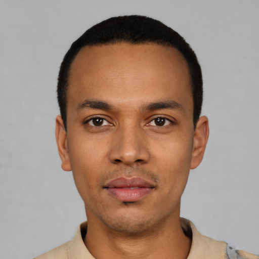 Neutral latino young-adult male with short  black hair and brown eyes