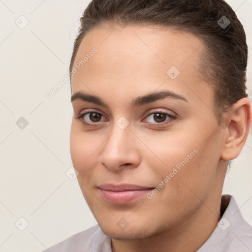 Joyful white young-adult female with short  brown hair and brown eyes