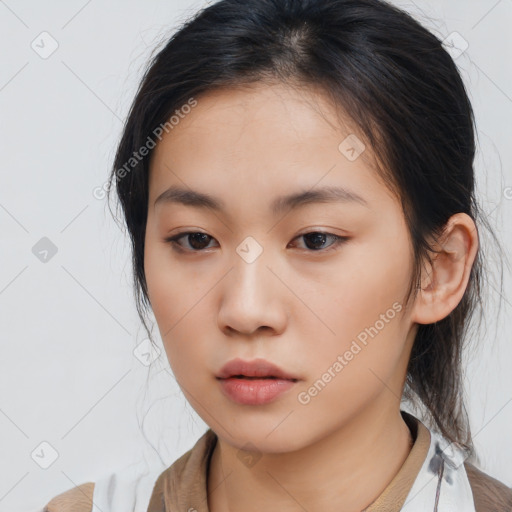 Neutral asian young-adult female with medium  brown hair and brown eyes