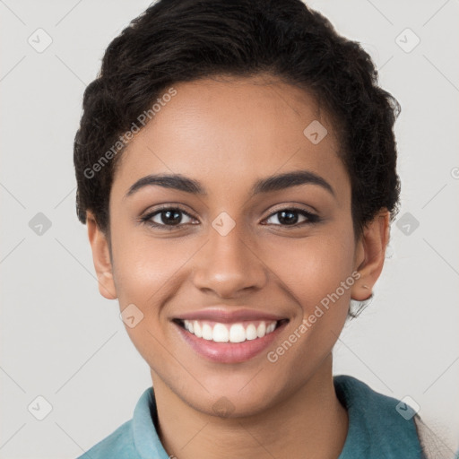 Joyful latino young-adult female with short  brown hair and brown eyes