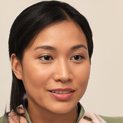 Joyful white young-adult female with medium  brown hair and brown eyes