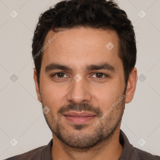 Joyful white young-adult male with short  black hair and brown eyes