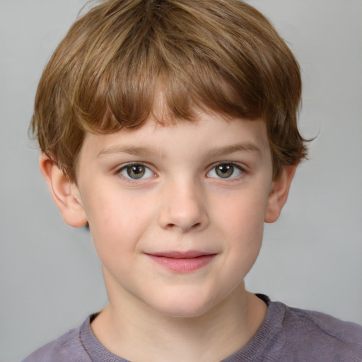 Joyful white child male with medium  brown hair and grey eyes