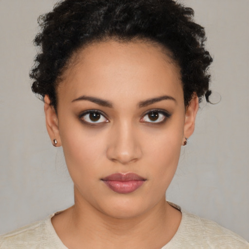 Neutral latino young-adult female with short  black hair and brown eyes