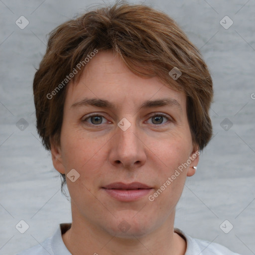 Joyful white young-adult female with short  brown hair and grey eyes