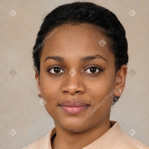 Joyful black young-adult female with short  black hair and brown eyes