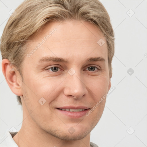 Joyful white adult male with short  brown hair and grey eyes