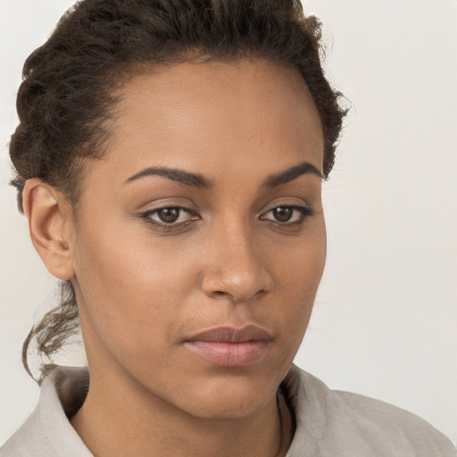 Neutral white young-adult female with short  brown hair and brown eyes