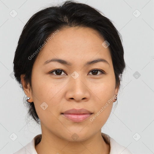 Joyful asian young-adult female with medium  brown hair and brown eyes