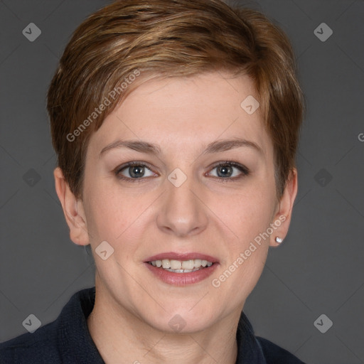 Joyful white young-adult female with short  brown hair and grey eyes